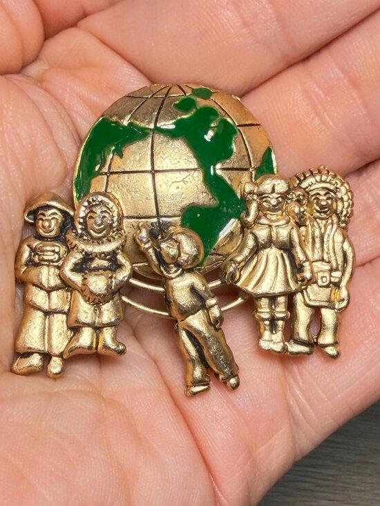 Jewelry - Vintage Children Around the World Brooch Globe Gold Tone Sliding Figure 1.85"
